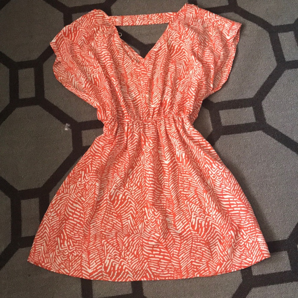 Orange and white print dress